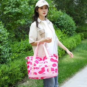 Pink leopard print travel duffel bag with large capacity and durable handles