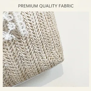 Macro shot of beige straw texture with white floral lace trim on tote bag detail
