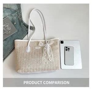 Detail view of woven tote with lace bow, showing capacity relative to tablet and phone