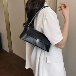 Classic black leather shoulder bag for women with silver clasp lock and minimalist design