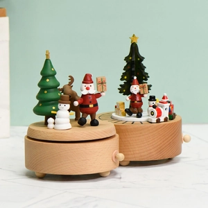 Mechanical wooden Christmas music box with Santa, reindeer and train on round base