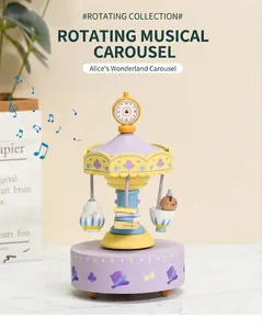 Detail of Alice in Wonderland themed wooden music box featuring teapot and clock elements