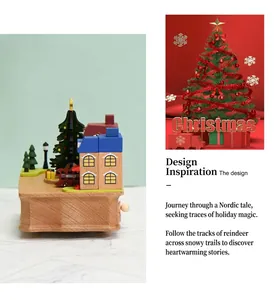 Detail of wooden Christmas music box featuring a red London bus and festive trees