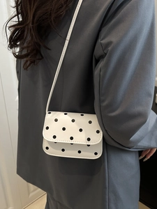 Classic white polka dot crossbody bag with black print for women spring fashion style