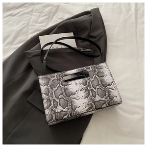 Detail of the chic black and white snakeskin pattern leather on an elegant handbag