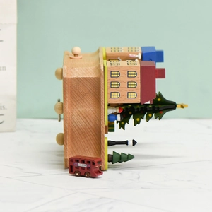 Wooden London city music box featuring a red double-decker bus and miniature street scene