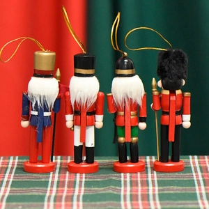 Set of four 13cm Nordic wooden nutcracker soldier ornaments with festive hanging gold strings