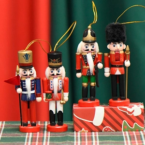 Set of four 13cm wooden nutcracker soldier ornaments with festive hanging ropes