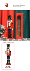 30cm Nutcracker soldier ornament detail showing 12-inch height and red gift box