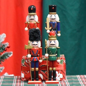 Set of four 18cm wooden nutcracker soldiers in classic blue and green Christmas colors