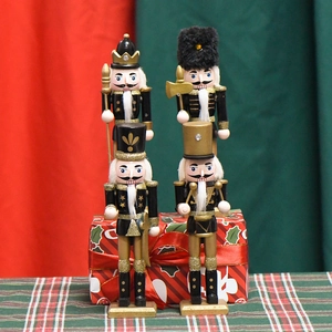 Set of 4 black and gold wooden nutcracker soldiers for Christmas home decor display