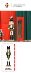 Detail of 15 inch wooden nutcracker soldier with drum and festive red gift box