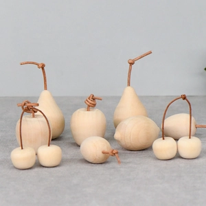 Minimalist unfinished wooden fruit set with pear apple and cherry DIY crafts