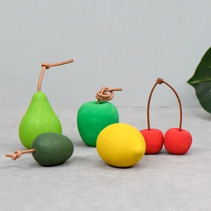 DIY handmade wooden fruit set including apple, pear and lemon with leather cord stems