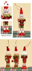 Detail of 13cm wooden Nutcracker ornaments with glitter accents and festive candy cane accessories
