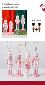 Set of four pink and white wooden nutcracker ornaments with festive gold hanging strings