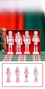 Set of four 13cm pink and white wooden nutcracker soldiers in a red gift box display