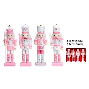 Set of 4 pink and white 13cm wooden nutcracker soldiers in a decorative gift box