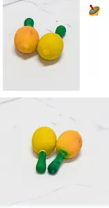 Macro detail of hand-painted lemon-shaped DIY wooden models with matte finish