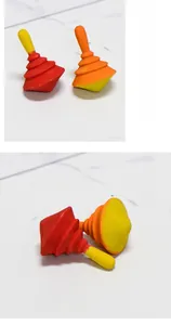 Macro shot of colorful wooden DIY spinning tops with layered texture for creative painting
