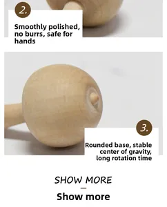 Detailed view of polished smooth wooden top toy with stable rounded spinning base
