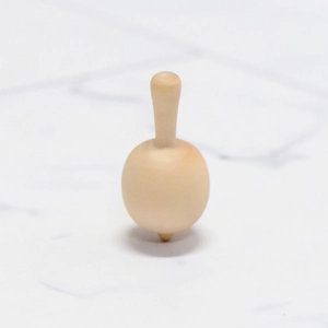 Minimalist wooden spinning top toy in natural solid wood for DIY painting crafts