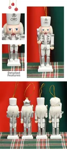 Set of four 13cm silver and white wooden nutcracker ornaments with golden hanging loops