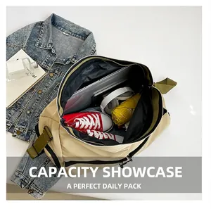 Spacious travel duffel bag showing organized interior compartments with laptop and accessories
