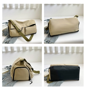 Detail view showing multi-pocket design and nylon straps of the khaki fitness bag
