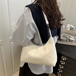 White woven texture crescent shoulder bag with elegant gold metal hardware for women
