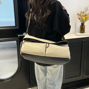 Large beige and grey gym bag with dry-wet separation and wide adjustable strap for travel