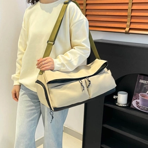 Off-white multi-functional travel bag with dry-wet separation and olive green strap