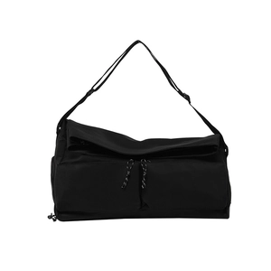 Multifunctional black nylon fitness bag with adjustable strap and utility pockets