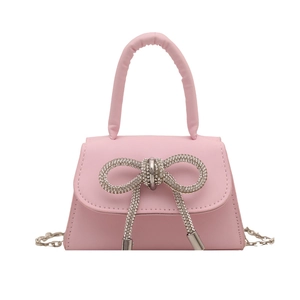 Petit sac à main rose chic avec noeud en strass brillant et bandoulière en chaîne