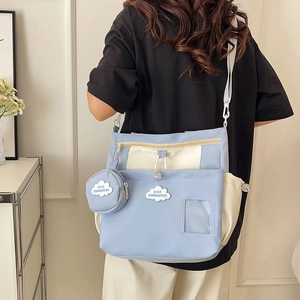 Japanese style color-block crossbody tote bag with adjustable strap and small round pouch