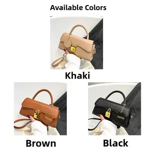 Detailed display of khaki, brown, and black crossbody bags with gold metal clasps