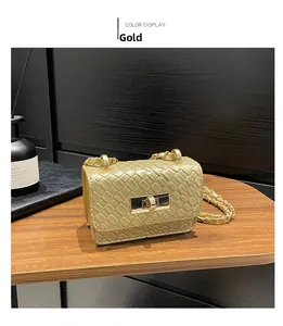 Detail of champagne gold woven chain bag with metallic square twist lock and leather strap