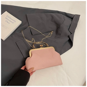 Detail of pink plaid woven crossbody bag with gold metal frame and chain strap