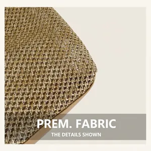 Close-up of high-quality woven straw fabric and detailed texture of the tote bag