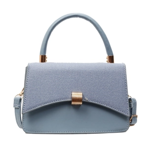Elegant blue textured patchwork square handbag with gold hardware and shoulder strap