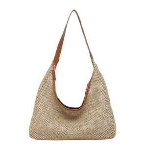 Retro handmade straw tote bag with brown leather handles and large hobo moon shape