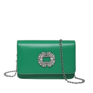 Elegant grass green leather crossbody bag with crystal buckle and silver chain strap
