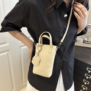 Minimalist beige PU leather crossbody phone bag with cute puppy charm and shoulder strap