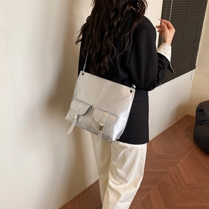 Silver metallic PU leather motorcycle hobo bag with dual pockets and sleek shoulder strap