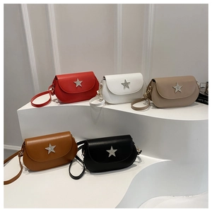 French vintage saddle bag collection with crystal star detail and adjustable straps