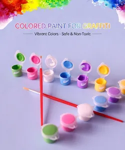 Detail view of colorful acrylic paint set with 6 colors and two red paintbrushes