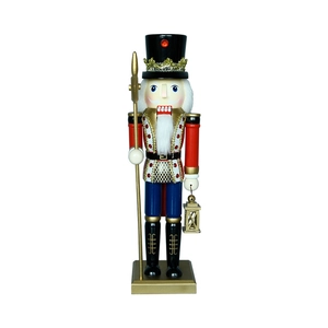Schiaccianoci di Natale classico in uniforme rossa e blu con lanterna decorativa