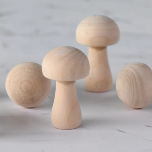 Set of four natural unpainted wooden mushrooms for DIY crafts and Nordic home decor