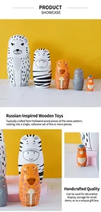 Detail of 5-piece set of hand-painted wooden nesting dolls with colorful animal motifs