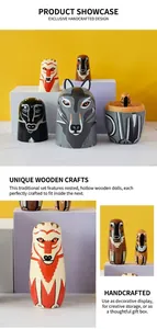 Detail of hand-painted wooden nesting dolls with forest wolf and fox patterns
